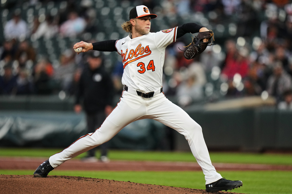 Baltimore Orioles starting pitcher Shane Baz (34) delivers during the third inning of a baseball game against the Houston Astros, Tuesday, April 28, 2026, in Baltimore. (AP Photo/Stephanie Scarbrough)
