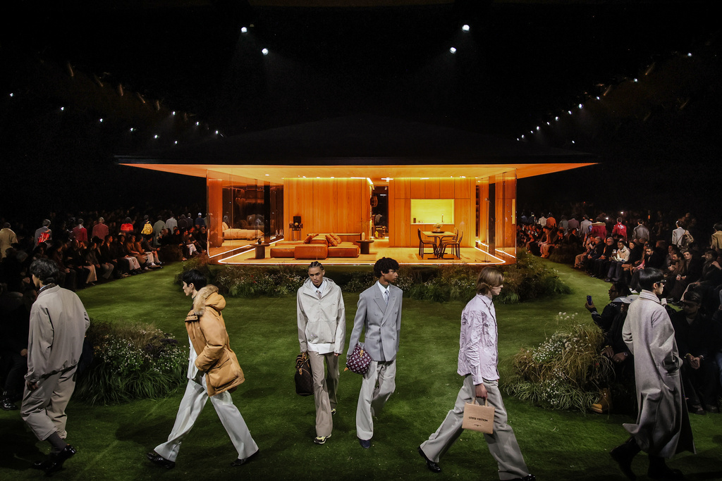 Models wear creations as part of the Louis Vuitton Fall/Winter 2026-2027 Men's collection presented in Paris, Tuesday, Jan. 20, 2026. (AP Photo/Thomas Padilla)
