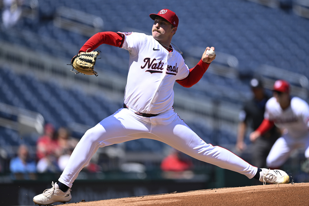 Washington Nationals starting pitcher Mitchell Parker throws during the first inning of a baseball game against the Miami Marlins, Wednesday, Sept. 3, 2025, in Washington. (AP Photo/John McDonnell)