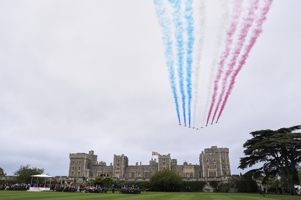 The Red Arrows fly in formation over Windsor Castle during the State visit of President Donald Trump and first lady Melania Trump in Windsor, England, Wednesday, Sept. 17, 2025. (AP Photo/Evan Vucci)