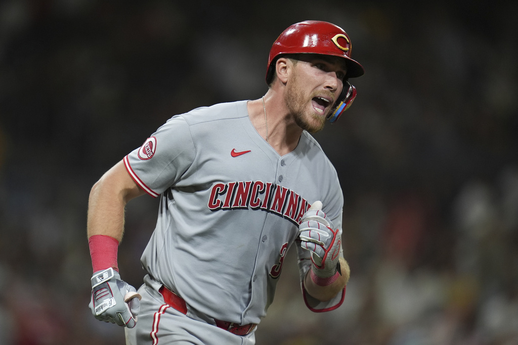 Cincinnati Reds' Tyler Stephenson celebrates after hitting a two-run home run during the ninth inning of a baseball game against the San Diego Padres Tuesday, Sept. 9, 2025, in San Diego. (AP Photo/Gregory Bull)