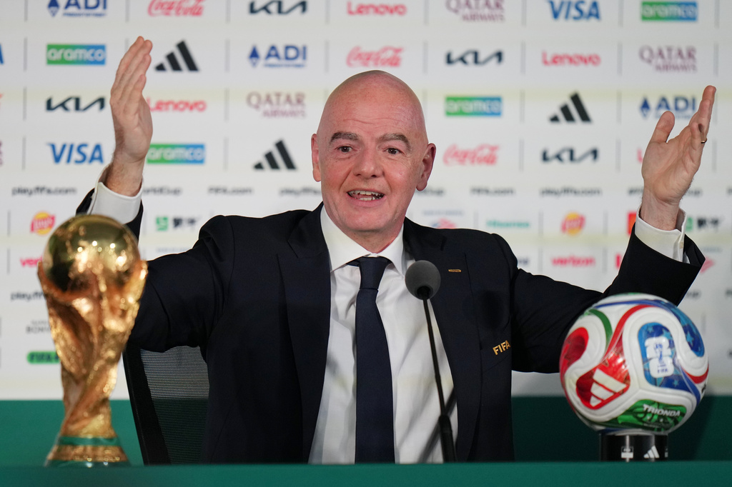 FIFA President Gianni Infantino speaks during a news conference at the stadium in Mexico City, Wednesday, June 10, 2026, a day before the opening FIFA World Cup match between Mexico and South Africa. (AP Photo/Eduardo Verdugo)