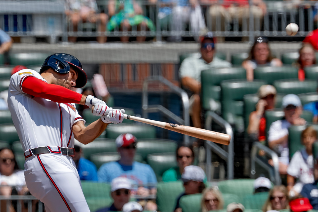 Atlanta Braves' Matt Olson hits a three-run home run against the Philadelphia Phillies during the first inning of a baseball game, Sunday, April 26, 2026, in Atlanta. (AP Photo/Erik S. Lesser)