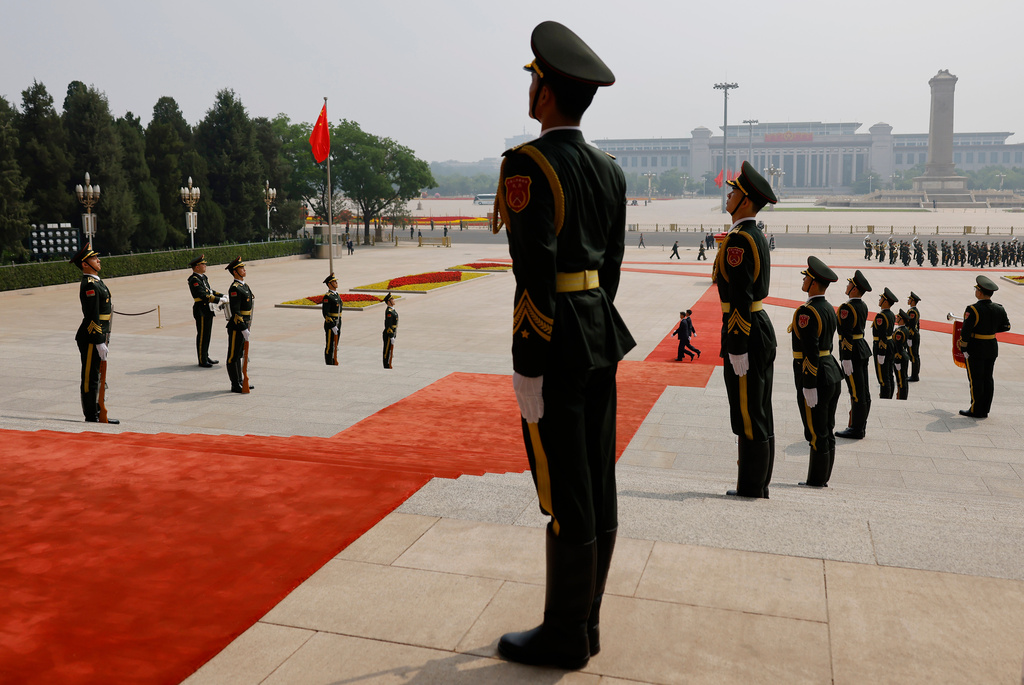 Honour guard members stand guard following the welcome ceremony for U.S. President Donald Trump, at the Great Hall of the People in Beijing, Thursday, May 14, 2026. (Maxim Shemetov/Pool Photo via AP)
