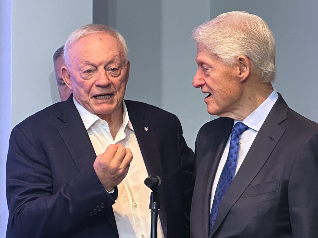 Former President Bill Clinton, right speaks with Dallas Cowboys owner Jerry Jones, left, during the NFL football team's pre-draft press conference Wednesday, April 22, 2026 in Frisco, Texas. (AP Photo/Schuyler Dixon)