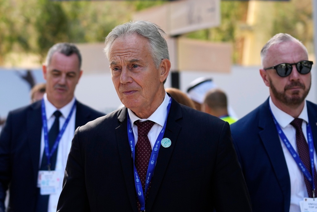 FILE - Britain's former Prime Minister Tony Blair walks through the COP28 U.N. Climate Summit, Sunday, Dec. 3, 2023, in Dubai, United Arab Emirates. (AP Photo/Rafiq Maqbool, file)