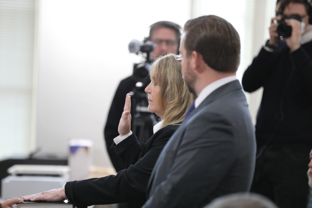 Former Colleton County Clerk of Court Mary Rebecca "Becky" Hill is sworn in during a court hearing on Monday, Dec. 8, 2025, in St. Matthews, S.C.. (AP Photo/Jeffrey Collins)