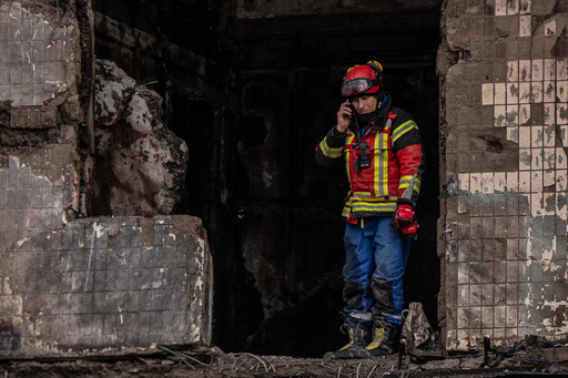 A worker stands inside a damaged apartment building following a Russian attack, Sunday, Oct. 26, 2025, in Kyiv, Ukraine. (AP Photo/Julia Demaree Nikhinson) A worker stands inside a damaged apartment building following a Russian attack, Sunday, Oct. 26, 2025, in Kyiv, Ukraine. (AP Photo/Julia Demaree Nikhinson)