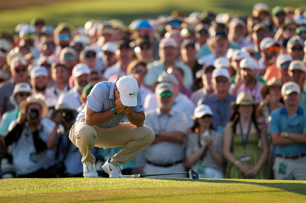 Rory McIlroy, of Northern Ireland, reacts before winning the Masters golf tournament at the Augusta National Golf Club, Sunday, April 12, 2026, in Augusta, Ga. (AP Photo/Ashley Landis)
