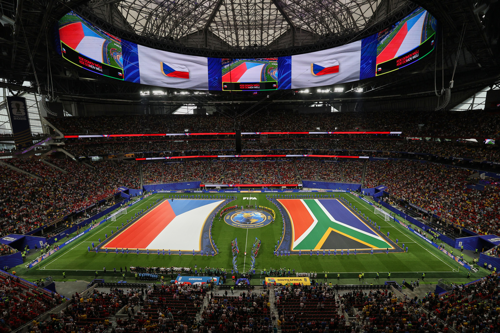 Czechia's and South Africa's flags are seen on the pitch before the World Cup Group A soccer match between Czechia and South Africa in Atlanta, Thursday, June 18, 2026. (AP Photo/Colin Hubbard)