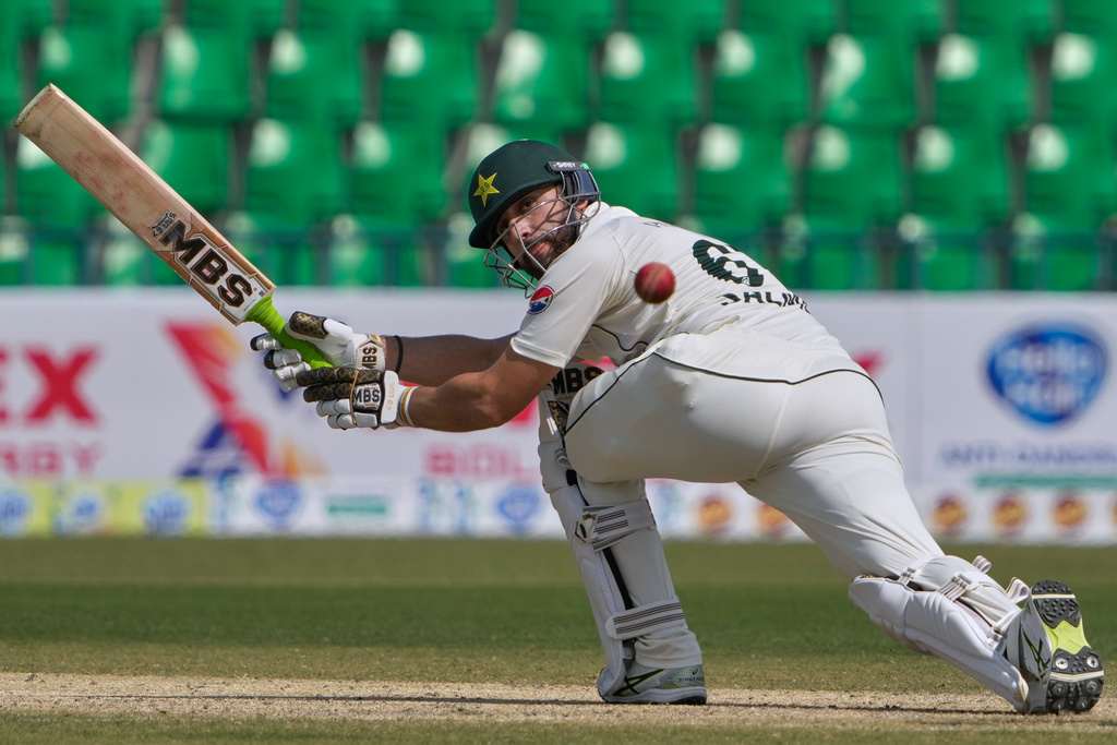 Pakistan's Salman Ali Agha plays a shot during the second day of the first test cricket match between Pakistan and South Africa, in Lahore, Pakistan, Monday, Oct. 13, 2025. (AP Photo/K.M. Chaudary)