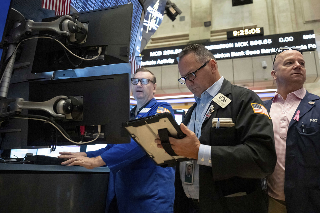 Trader Edward Curran works on the floor of the New York Stock Exchange, Thursday, Aug. 27, 2026, in New York. (AP Photo/Yuki Iwamura)