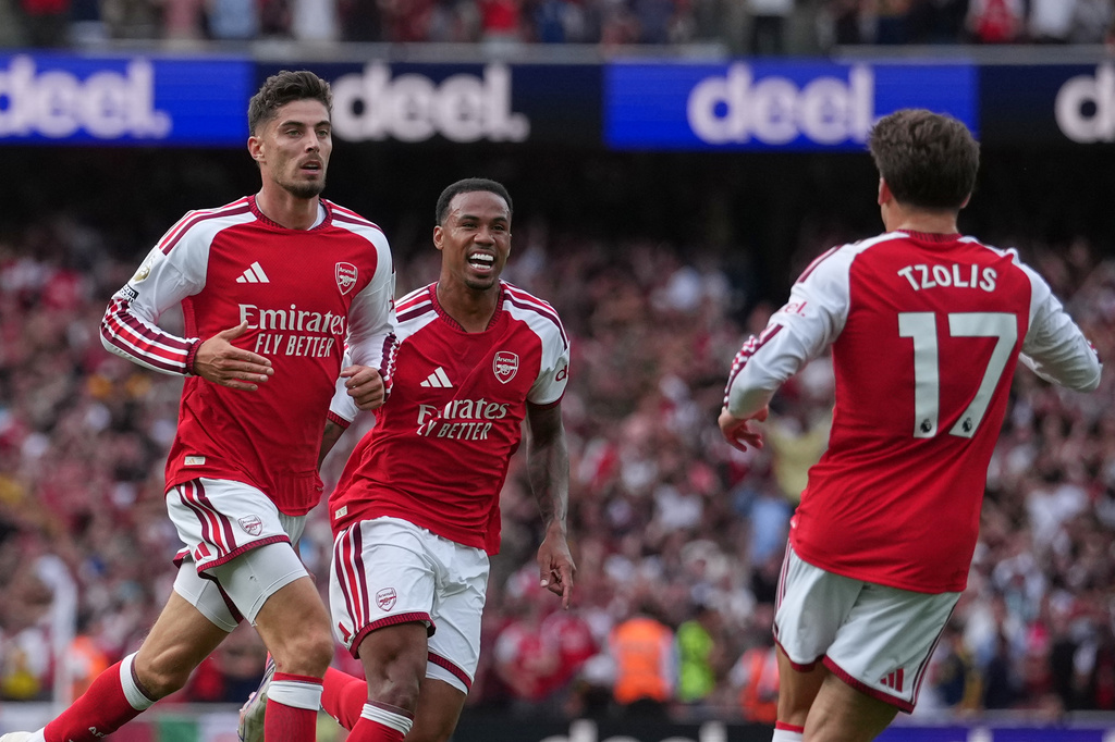 From left, Arsenal's Kai Havertz, Arsenal's Gabriel, Arsenal's Christos Tzolis react during the English Premier League soccer match between Arsenal and Chelsea in London, Sunday, Sept. 6, 2026. (AP Photo/Dave Shopland)