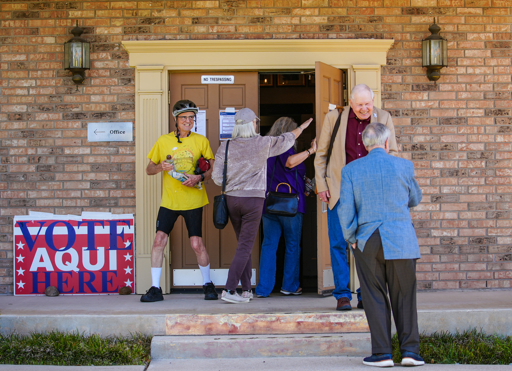 Voters in central Texas head to an active polling station at the Ben Hur Shriners Ballroom to vote, in north Austin, Texas, Tuesday, March 3, 2026. (Ricardo B. Brazziell/Austin American-Statesman via AP)
