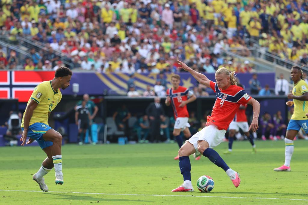 Norway's Erling Haaland (9) shoots and scores their second goal during the World Cup round of 16 soccer match between Brazil and Norway in East Rutherford, N.J., near New York, Sunday, July 5, 2026. (AP Photo/Pamela Smith)