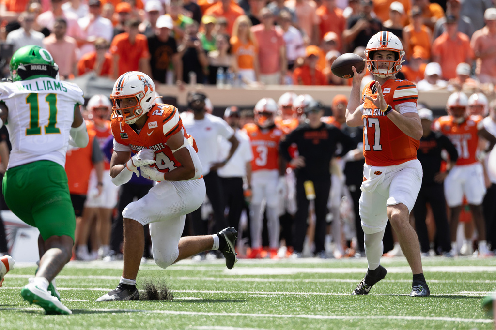 Oklahoma State quarterback Drew Mestemaker (17) passes the ball in the first half of the NCAA college football game against Oregon in Stillwater, Okla., Saturday, Sept. 12, 2026. (AP Photo/Mitch Alcala)