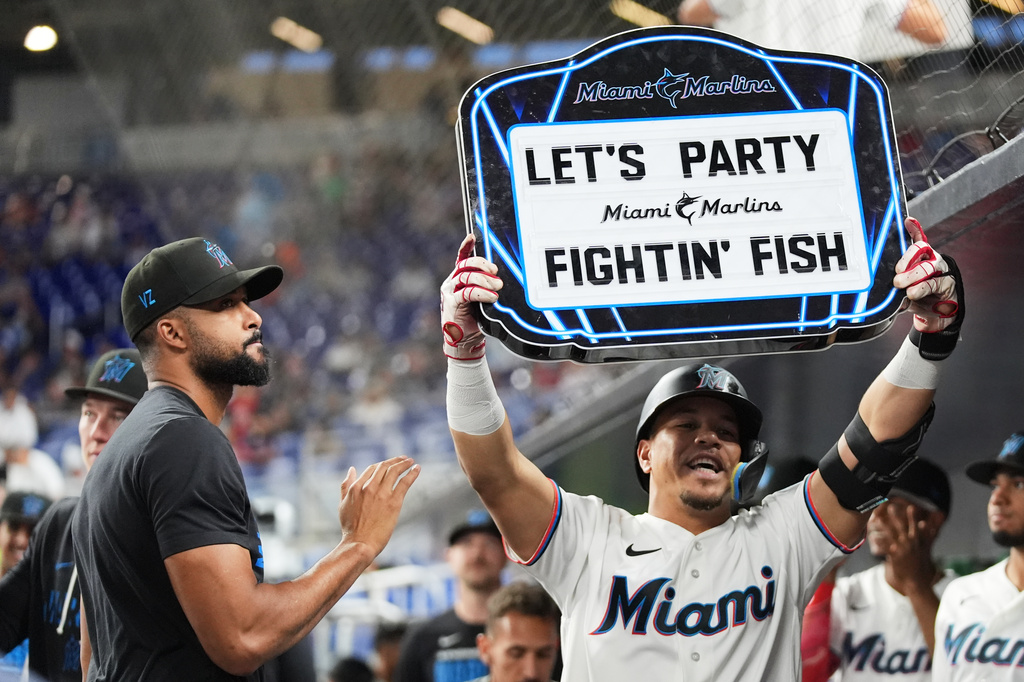 Miami Marlins' Heriberto Hernández celebrates after hitting a solo home run during the first inning of a baseball game against the Philadelphia Phillies, Monday, July 27, 2026, in Miami. (AP Photo/Lynne Sladky)