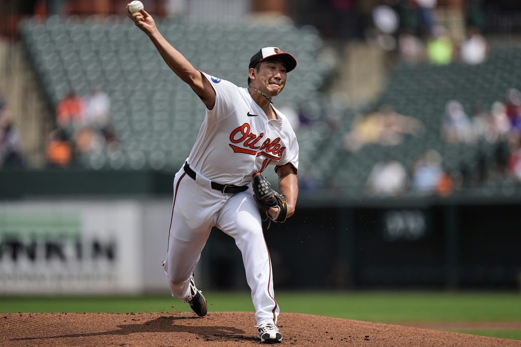 Baltimore Orioles starting pitcher Tomoyuki Sugano delivers during the first inning of a baseball game against the Seattle Mariners, Thursday, Aug. 14, 2025, in Baltimore. (AP Photo/Stephanie Scarbrough)