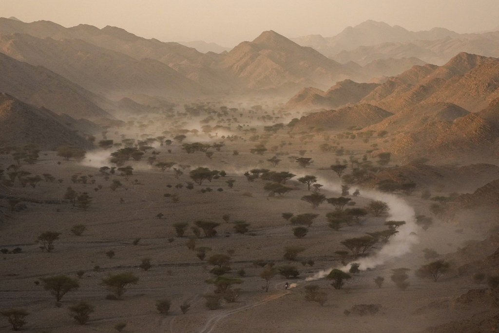A rider steers his bike during the second stage of the Dakar Rally between Yanbu and Alula, Saudi Arabia, Monday, Jan. 5, 2026. (AP Photo/Thibault Camus)