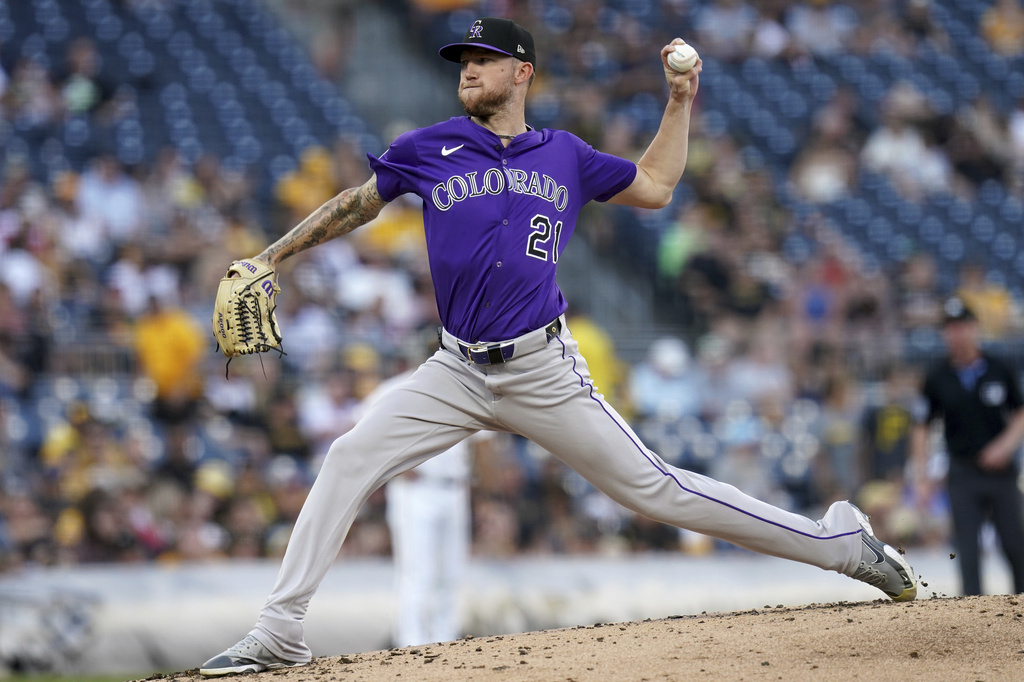 Colorado Rockies pitcher Kyle Freeland delivers during the first inning of a baseball game against the Pittsburgh Pirates Saturday, Aug. 23, 2025, in Pittsburgh. (AP Photo/Matt Freed)