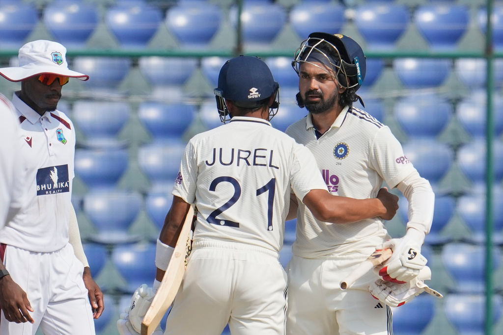 India's wicketkeeper Dhruv Jurel and KL Rahul congratulate each other after wining the second cricket test match between India and West Indies at the Arun Jaitley Stadium in New Delhi, India, Tuesday, Oct.14, 2025. (AP Photo/Manish Swarup)