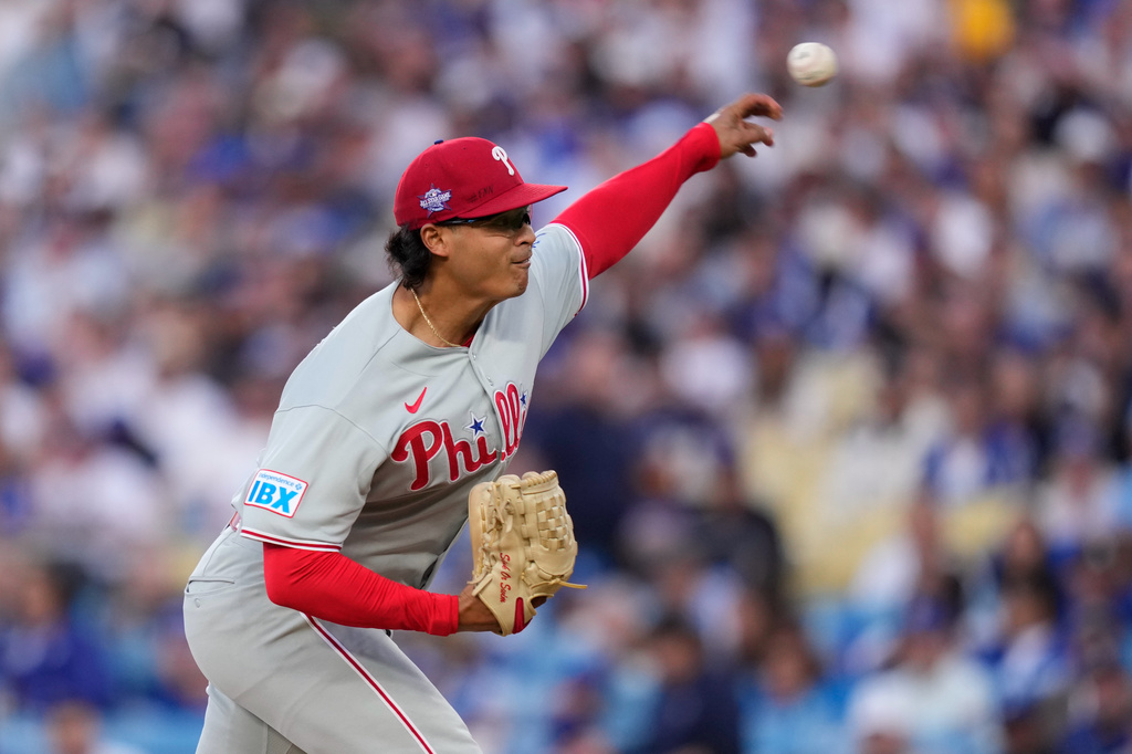 Philadelphia Phillies starting pitcher Jesús Luzardo throws to the plate during the first inning of a baseball game against the Los Angeles Dodgers, Saturday, May 30, 2026, in Los Angeles. (AP Photo/Mark J. Terrill)