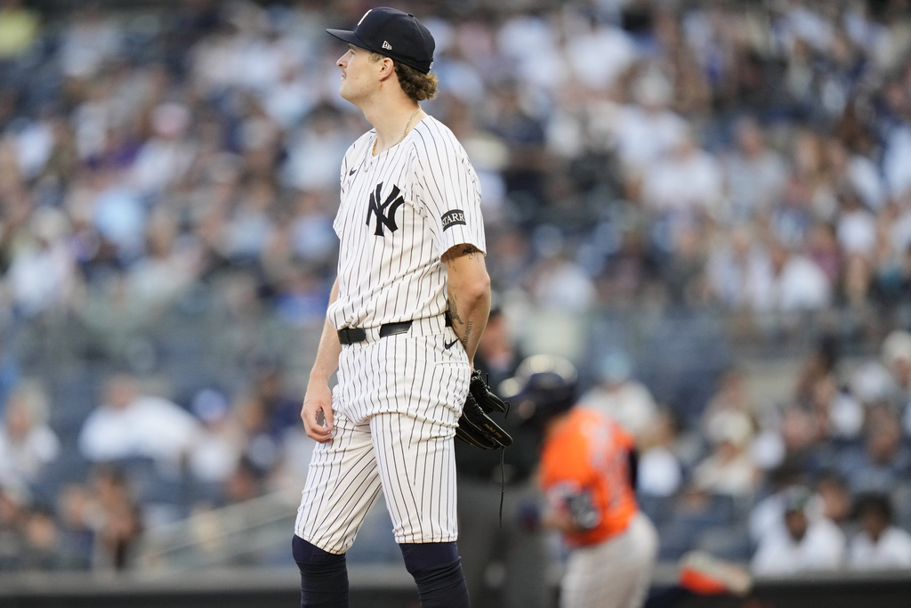 New York Yankees pitcher Cam Schlittler reacts as Houston Astros' Jose Altuve runs the bases after hitting a two-run home run during the first inning of a baseball game Friday, Aug. 8, 2025, in New York. (AP Photo/Frank Franklin II)