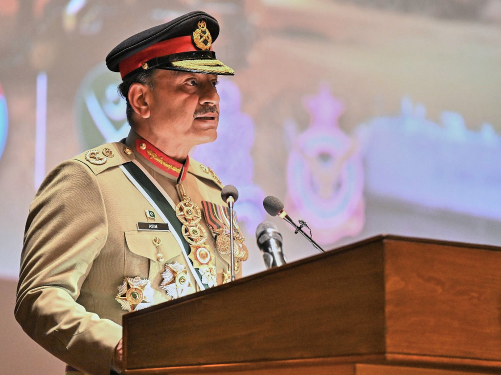 In this photo released by the Inter Services Public Relations, Pakistan's Chief of Defense Forces and Army Chief Gen. Asim Munir speaks during a ceremony at the joint military command headquarters in Rawalpindi, Pakistan, Monday, Dec. 8, 2025. (Inter Services Public Relations via AP)