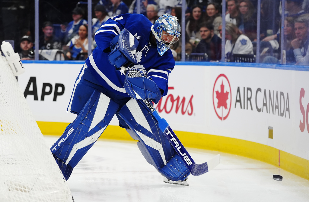 Toronto Maple Leafs goaltender Anthony Stolarz (41) clears the puck during first period NHL hockey action against the Montreal Canadiens in Toronto, Canada on Wednesday, Oct. 8, 2025. (Frank Gunn/The Canadian Press via AP)