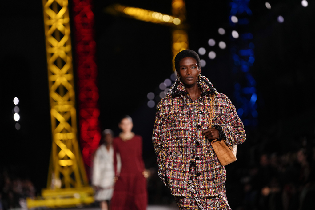 A model wears a creation as part of the Chanel Fall/Winter 2026-2027 Women's collection presented in Paris, Monday, March 9, 2026. (AP Photo/Aurelien Morissard)
