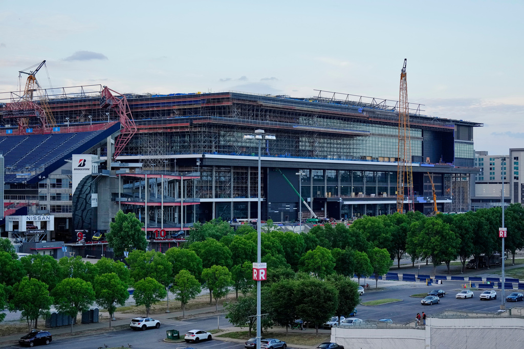 FILE - Construction continues on a new enclosed stadium for the Tennessee Titans NFL football team Monday, May 18, 2026, in Nashville, Tenn. (AP Photo/George Walker IV, File)