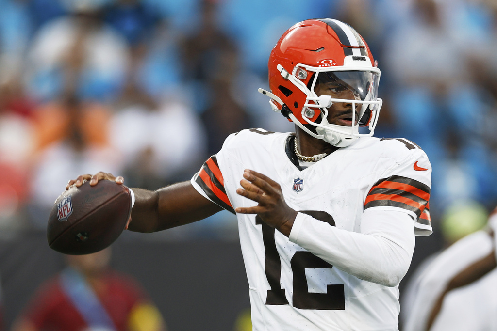 Cleveland Browns quarterback Shedeur Sanders passes against the Carolina Panthers during the first half of a preseason NFL football game on Friday, Aug. 8, 2025, in Charlotte, N.C. (AP Photo/Rusty Jones)