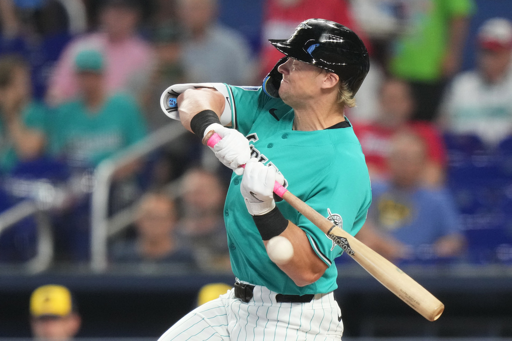 Miami Marlins Kyle Stowers is hit by a pitch thrown by Milwaukee Brewers pitcher Jacob Misiorowski during the first inning of a baseball game, Sunday, April 19, 2026, in Miami. (AP Photo/Lynne Sladky)