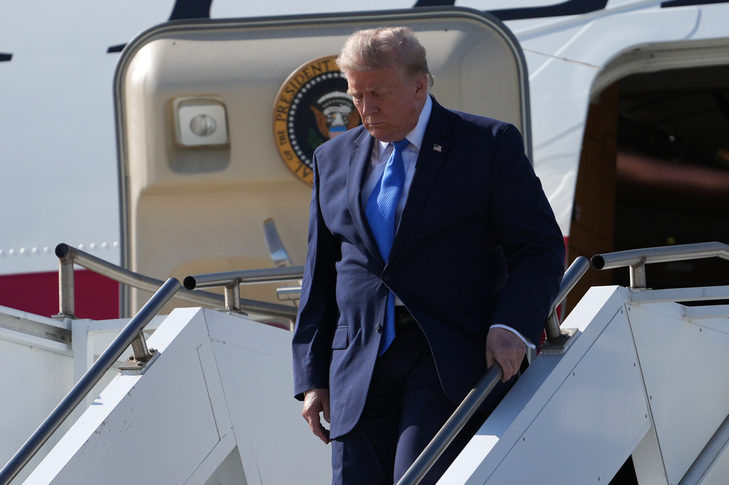 President Donald Trump arrives on Air Force One, Tuesday, Aug. 4, 2026, at Los Angeles International Airport in Los Angeles. (AP Photo/Mark Schiefelbein)