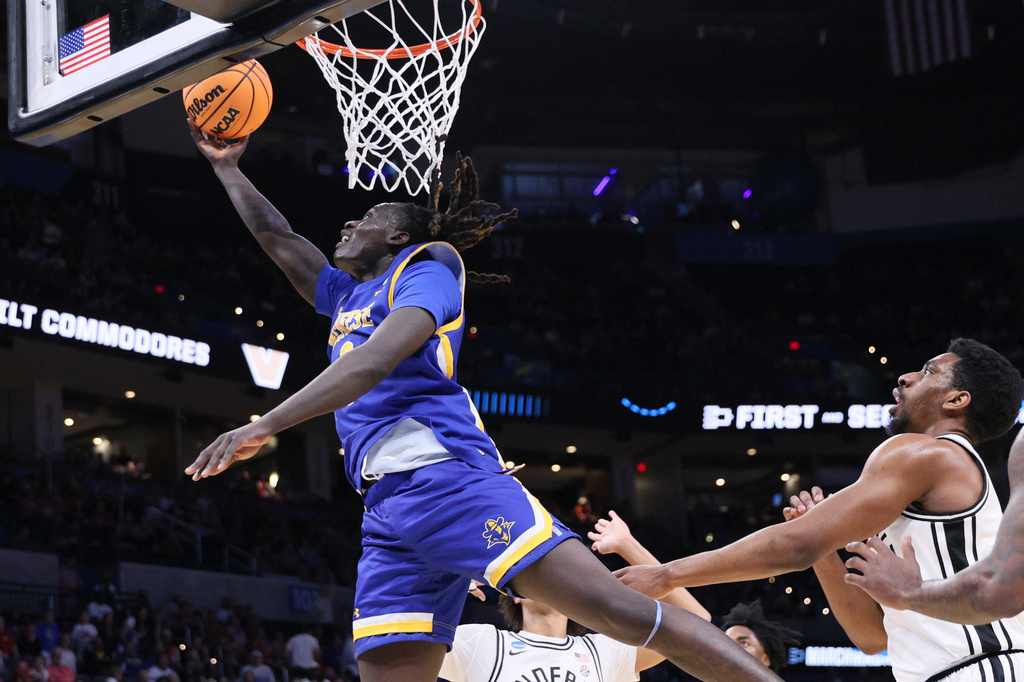 McNeese guard Garwey Dual goes to the basket against Vanderbilt during the first half in the first round of the NCAA college basketball tournament, Thursday, March 19, 2026, in Oklahoma City. (AP Photo/Nate Billings)