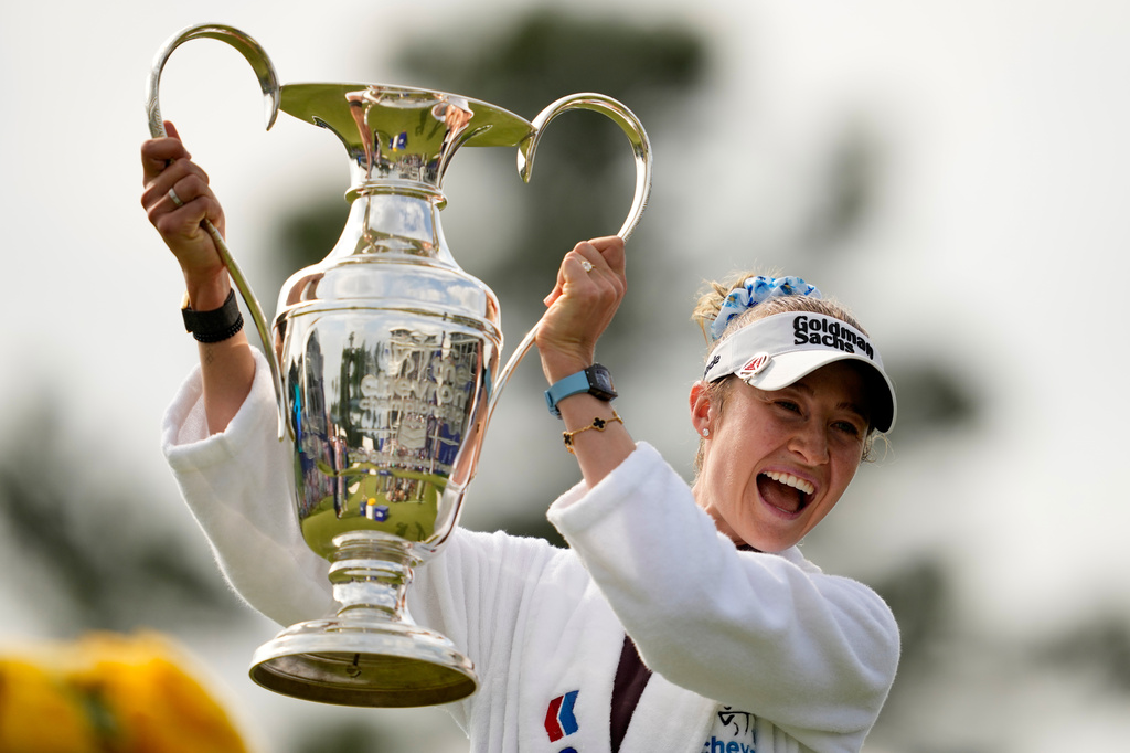 Nelly Korda holds the trophy after winning the Chevron Championship LPGA golf tournament Sunday, April 26, 2026, in Houston. (AP Photo/Ashley Landis)
