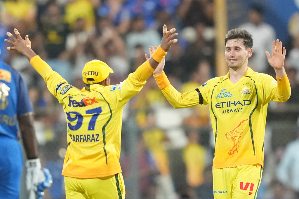 Chennai Super Kings' Noor Ahmad, right, celebrates with teammates the wicket of Mumbai Indians' captain Hardik Pandya during the Indian Premier League cricket match between Mumbai Indians and Chennai Super Kings in Mumbai, India, Thursday, April 23, 2026.(AP Photo/ Rafiq Maqbool)