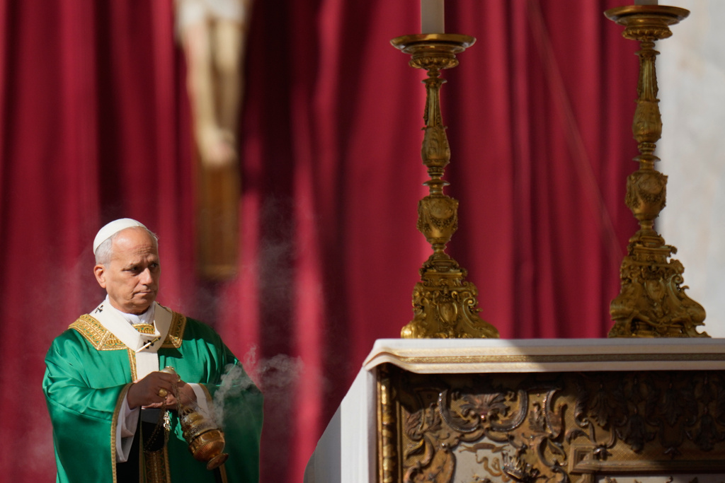 Pope Leo XIV presides over a Mass for the participants in the jubilee of ordained people in St. Peter's Square, at the Vatican, Thursday, Oct. 9, 2025. (AP Photo/Gregorio Borgia)