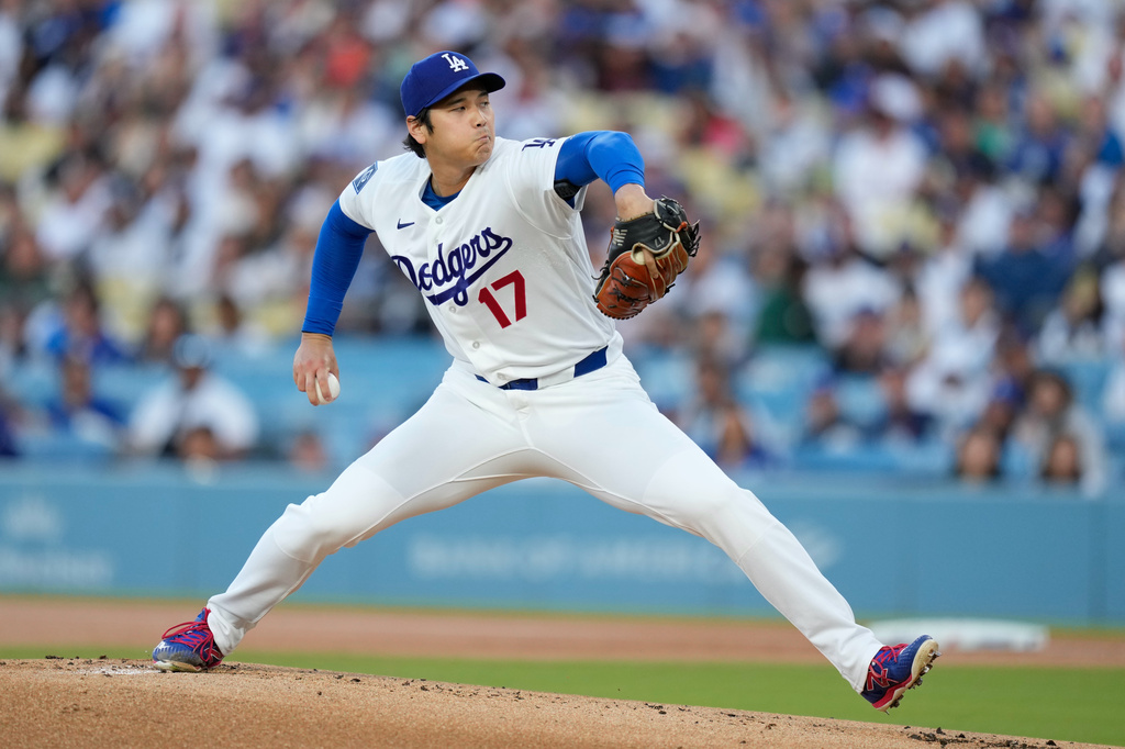 Los Angeles Dodgers pitcher Shohei Ohtani throws to the plate during the first inning of a baseball game against the San Francisco Giants, Wednesday, May 13, 2026, in Los Angeles. (AP Photo/Mark J. Terrill)