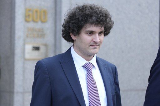 FILE - FTX founder Sam Bankman-Fried leaves Federal court, Wednesday, July 26, 2023, in New York. Prosecutors asked a New York judge on Friday, March 15, 2024 to sentence FTX founder Sam Bankman-Fried to between 40 and 50 years in prison for cryptocurrency crimes they described as a &ldquo;historic fraud.&rdquo;(AP Photo/Mary Altaffer)
