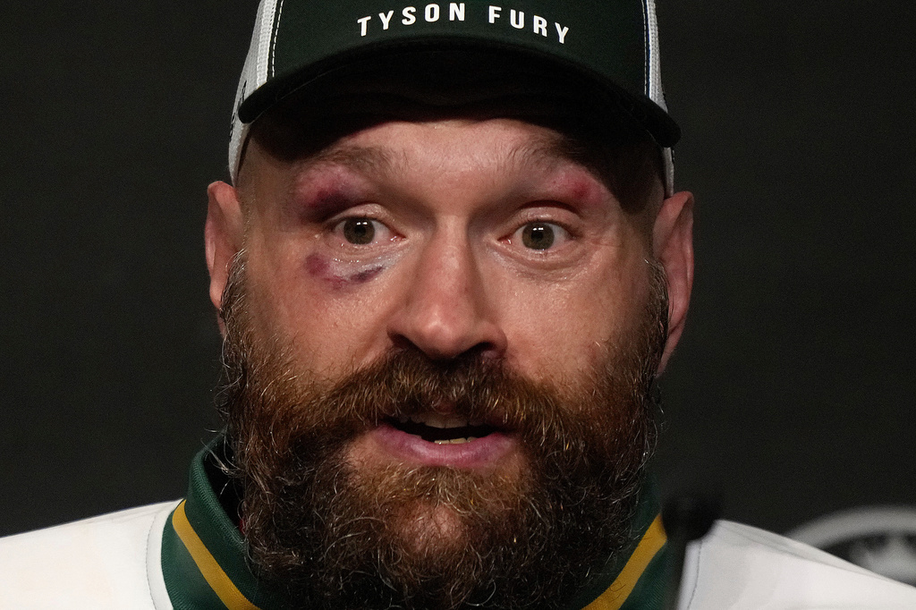 FILE - Britain's boxer Tyson Fury speaks at a press conference after loosing his fight against Ukraine's boxer Oleksandr Usyk for the WBA, WBO, and WBC heavyweight title in Riyadh, Saudi Arabia, on Dec. 22, 2024. (AP Photo/Frank Augstein, File)