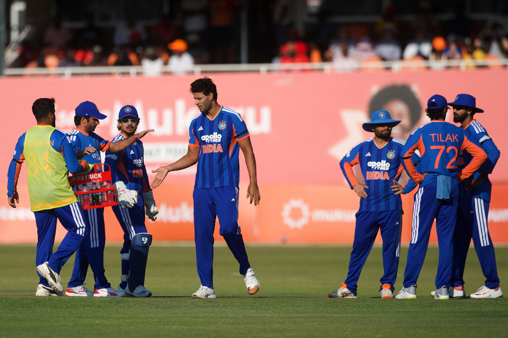 India's players celebrate a wicket during the second T20 cricket match between Zimbabwe and India in Harare, Zimbabwe, Saturday, July 25, 2026. (AP Photo/Wonder Mashura)