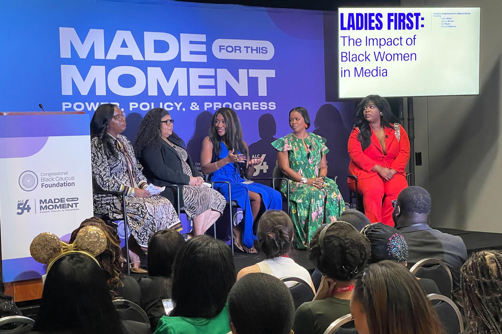 Former Washington Post opinion columnist Karen Attiah, center, speaks during a panel discussion about the impact of Black women in media at the Congressional Black Caucus's Annual Legislative Conference in Washington, Wednesday, Sept. 24, 2025. (AP Photo/Matt Brown)