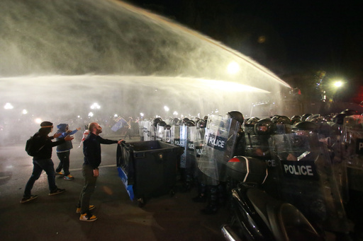 Police use a water cannon to block protesters during an opposition rally in the city center of Tbilisi, Georgia, on Saturday, Oct. 4, 2025, boycotting the municipal elections and call for the release of political opponents. (AP Photo/Zurab Tsertsvadze) Police use a water cannon to block protesters during an opposition rally in the city center of Tbilisi, Georgia, on Saturday, Oct. 4, 2025, boycotting the municipal elections and call for the release of political opponents. (AP Photo/Zurab Tsertsvadze)