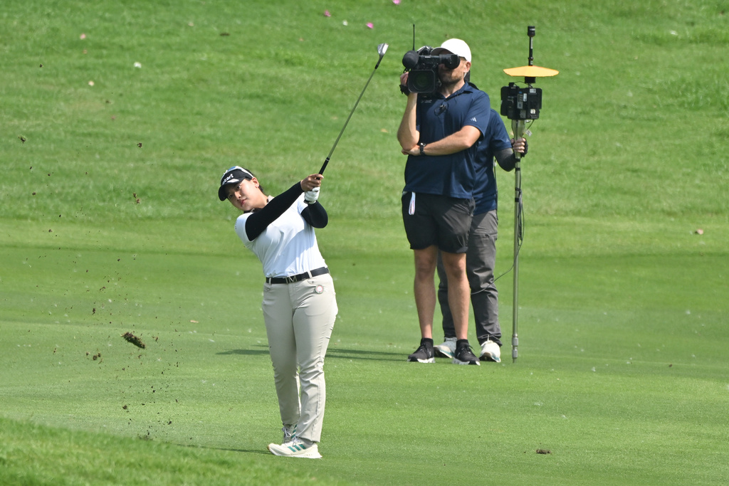 Chanettee Wannasaen of Thailand watches her shot on the 1st green during the first round of the LPGA Honda Thailand golf tournament in Pattaya, Thailand, Thursday, Feb. 19, 2026. (AP Photo/Kittinun Rodsupan)