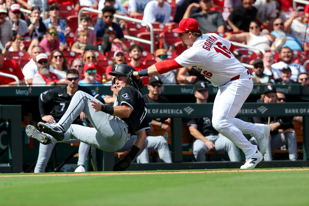 Chicago White Sox's Sam Antonacci is tagged out by St. Louis Cardinals' Nolan Gorman during the sixth inning of a baseball game Sunday, Sept. 13, 2026, in St. Louis. (AP Photo/Scott Kane)
