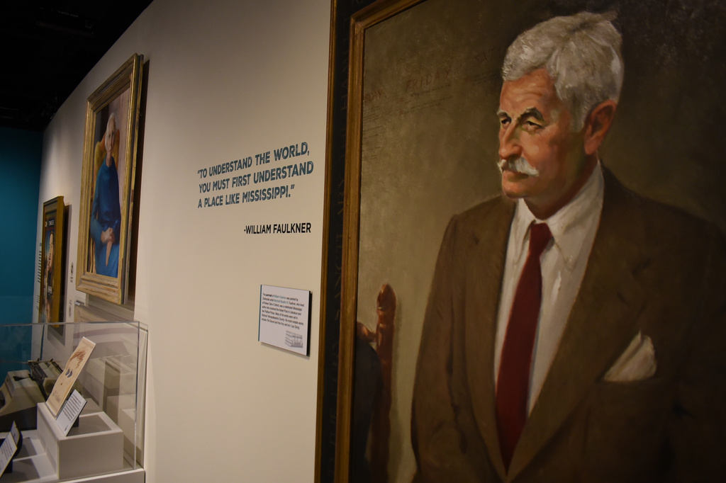 A William Faulkner quote displayed in the Mississippi Made exhibit reads, "To understand the world, you must first understand a place like Mississippi," on Friday, March 27, 2026, in Jackson, Miss. (AP Photo/Sophie Bates)
