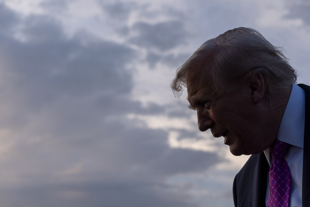 President Donald Trump speaks with reporters before he departs on Air Force One at Morristown Airport, Sunday, Sept. 14, 2025, in Morristown, N.J. (AP Photo/Alex Brandon)