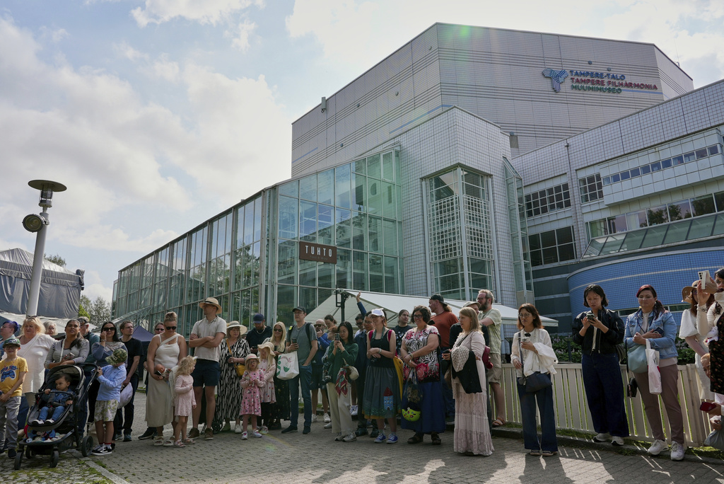Finland Moomins Fans celebrate the 80th anniversary of the publication of the Finnish children's classic, "The Moomins and The Great Flood," and the birthday of the author Tove Jansson, in Tampere, Finland, Saturday, Aug. 9, 2025. (AP Photo/Tommi Ojala)