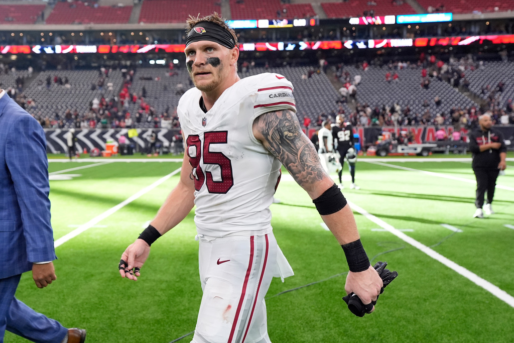 Arizona Cardinals tight end Trey McBride walks off the field after an NFL football game against the Houston Texans Sunday, Dec. 14, 2025, in Houston. (AP Photo/Ashley Landis)